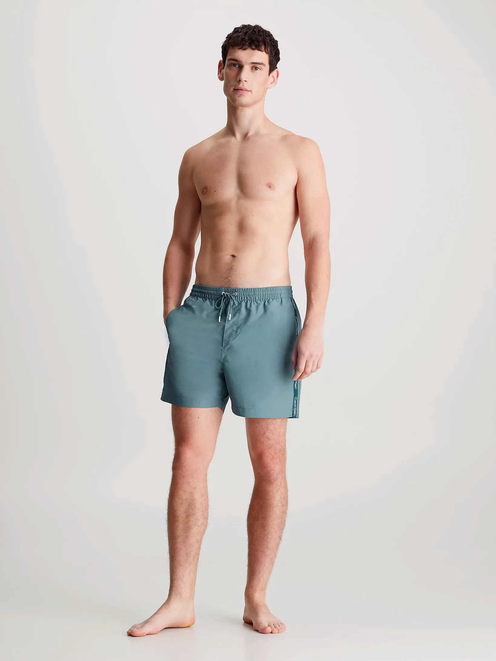 Calvin Klein Mens Medium Length Swim Short With Logo Tape